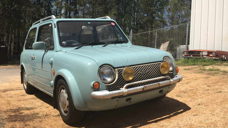 Illustration for article titled How I'm Living With My Imported 1990 Nissan Pao In The Summertime